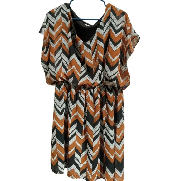 Charming Charlie Dresses & Skirts - Charming Charlie Chevron Print Burnt Orange, Black, and White Midi Dress XL